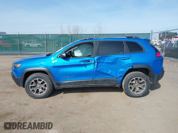 2021 Jeep Cherokee Trailhawk with VIN 1C4PJMBX4MD222987, listed as a IAAI auction lot 41771808 with 52,533 mi miles and . Bid and sale history available at DreamBid. Image 14.