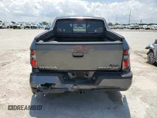 2012 Honda Ridgeline RTL z VIN 5FPYK1F54CB451175, wystawiony jako Copart lot #59536285 z przebiegiem 160 476 mil mil oraz Szkoda całkowita • Salvage title. Historia ofert i sprzedaży dostępna na DreamBid. Obrazek 6.