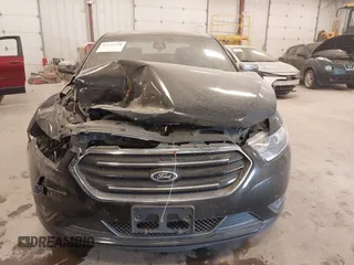 2014 Ford Taurus Limited z VIN 1FAHP2J88EG112614, wystawiony jako IAAI lot #42135220 z przebiegiem 70 409 mil mil oraz . Historia ofert i sprzedaży dostępna na DreamBid. Obrazek 6.