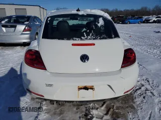 2014 Volkswagen Beetle with VIN 3VWHX7AT1EM617442, listed as a Copart auction lot 89093225 with 74,146 mi miles and Salvage Title. Bid and sale history available at DreamBid. Image 6.