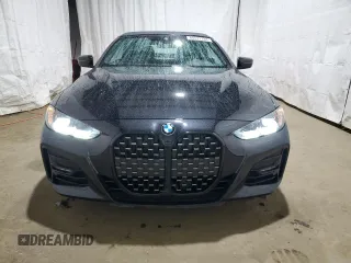 2023 BMW 4 Series 430i z VIN WBA23AT06PCL91792, wystawiony jako Copart lot #85511134 z przebiegiem 14 326 mil mil oraz Nie do naprawy. Historia ofert i sprzedaży dostępna na DreamBid. Obrazek 5.