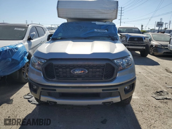 2020 Ford Ranger XL with VIN 1FTER1EH9LLA58935, listed as a Copart auction lot 56189695 with 14,283 mi miles and Salvage Title. Bid and sale history available at DreamBid. Image 5.