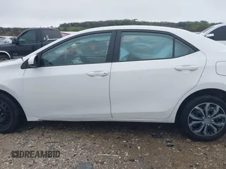 2016 Toyota Corolla L with VIN 5YFBURHE5GP485592, listed as a IAAI auction lot 41930690 with 121,861 mi miles and . Bid and sale history available at DreamBid. Image 15.