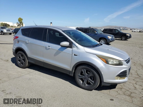 2013 Ford Escape SE with VIN 1FMCU0GX1DUC86164, listed as a Copart auction lot 56565575 with 134,118 mi miles and Clean Title. Bid and sale history available at DreamBid. Image 4.