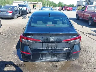 2023 Honda Civic Sport with VIN 2HGFE2F56PH509382, listed as a IAAI auction lot 42296205 with 125,584 mi miles and . Bid and sale history available at DreamBid. Image 16.