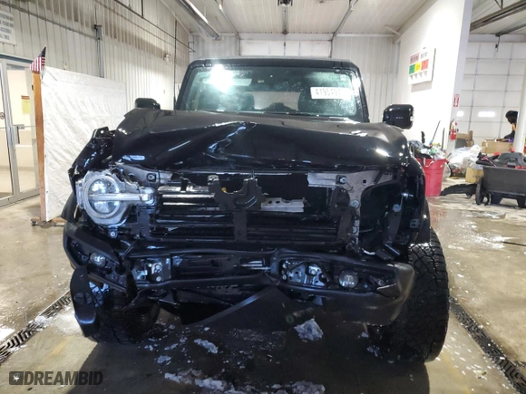 2023 Ford Bronco with VIN 1FMEE5BP5PLA99823, listed as a Copart auction lot 41954945 with 58,938 mi miles and Salvage Title. Bid and sale history available at carsss.com. Image 5.