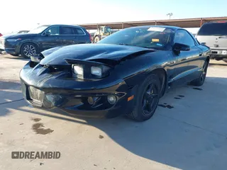 2002 Pontiac Firebird with VIN 2G2FS22K022109417, listed as a IAAI auction lot 41199057 with 124,463 mi miles. Bid and sale history available at carsss.com. Image 2.