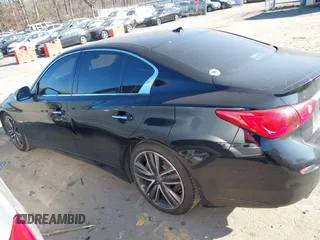 2014 Infiniti Q50 Hybrid Premium with VIN JN1AV7APXEM690577, listed as a IAAI auction lot 41493689 with 89,337 mi miles and . Bid and sale history available at DreamBid. Image 14.