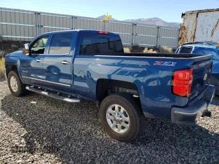 2015 Chevrolet Silverado 3500HD LTZ with VIN 1GC4K0E80FF577143, listed as a Copart auction lot 76626244 with 41,587 mi miles and Salvage Title. Bid and sale history available at carsss.com. Image 2.