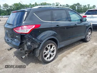 2013 Ford Escape Titanium z VIN 1FMCU9J93DUC06684, wystawiony jako IAAI lot #42606418 z przebiegiem 109 270 mil mil oraz . Historia ofert i sprzedaży dostępna na DreamBid. Obrazek 4.