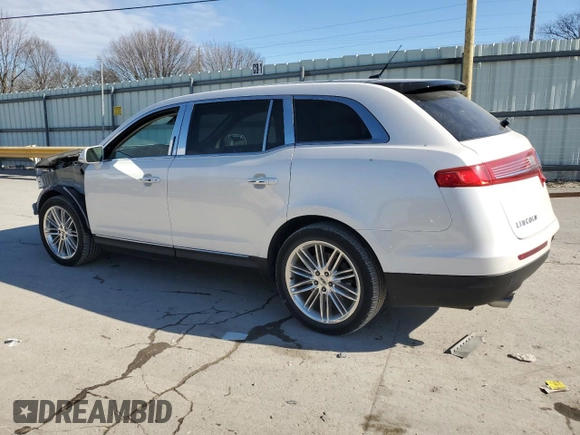 2016 Lincoln MKT EcoBoost z VIN 2LMHJ5AT5GBL01314, wystawiony jako Copart lot #88693385 z przebiegiem 75 777 mil mil oraz Szkoda całkowita • Salvage title. Historia ofert i sprzedaży dostępna na DreamBid. Obrazek 2.