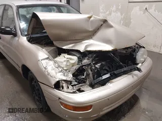 1997 Geo Prizm z VIN 1Y1SK526XVZ406366, wystawiony jako IAAI lot #41409191 z przebiegiem 259 489 mil mil oraz . Historia ofert i sprzedaży dostępna na DreamBid. Obrazek 6.