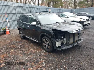 2019 Subaru Forester Touring with VIN JF2SKAWC8KH551518, listed as a IAAI auction lot 41559359 with 110,454 mi miles. Bid and sale history available at carsss.com. Image 1.