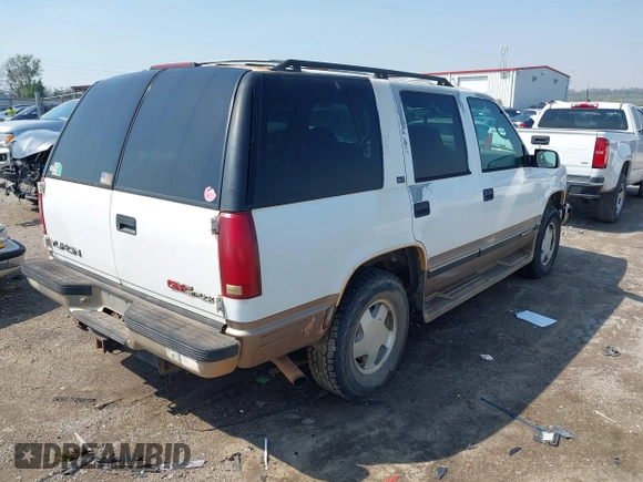 1996 GMC Yukon with VIN 1GKEK13R2TJ746811, listed as a IAAI auction lot 41955840 with 2,242,108 mi miles. Bid and sale history available at carsss.com. Image 15.