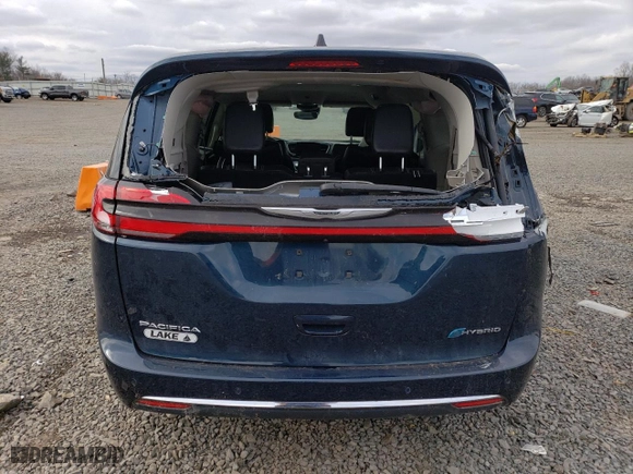 2023 Chrysler Pacifica Hybrid Touring L with VIN 2C4RC1L70PR614642, listed as a Copart auction lot 45933065 with 94,992 mi miles and Salvage Title. Bid and sale history available at carsss.com. Image 6.