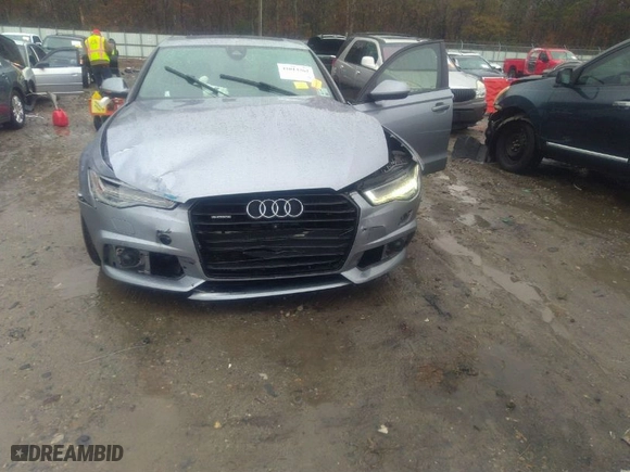 2016 Audi A6 3.0T Premium Plus with VIN WAUFGAFC6GN177739, listed as a IAAI auction lot 41013262 with 89,865 mi miles. Bid and sale history available at carsss.com. Image 6.