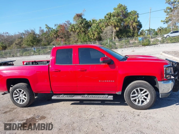 2018 Chevrolet Silverado 1500 LT with VIN 1GCRCREC1JZ170659, listed as a IAAI auction lot 41522588 with 129,412 mi miles and . Bid and sale history available at DreamBid. Image 14.