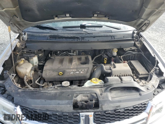 2013 Dodge Journey American Value z VIN 3C4PDCABXDT621551, wystawiony jako Copart lot #52523675 z przebiegiem 123 348 mil mil oraz Szkoda całkowita • Salvage title. Historia ofert i sprzedaży dostępna na DreamBid. Obrazek 12.