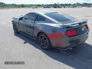 2015 Ford Mustang GT z VIN 1FA6P8CFXF5368661, wystawiony jako IAAI lot #42442905 z przebiegiem 117 064 mil mil oraz . Historia ofert i sprzedaży dostępna na DreamBid. Obrazek 3.