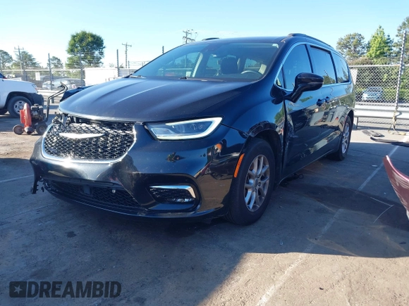 2022 Chrysler Pacifica Touring L with VIN 2C4RC1BG9NR117538, listed as a IAAI auction lot 42318518 with 103,311 mi miles and . Bid and sale history available at DreamBid. Image 18.