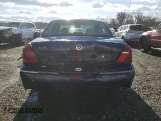 2005 Mercury Grand Marquis LS Premium z VIN 2MEHM75WX5X600920, wystawiony jako Copart lot #86592764 z przebiegiem 94 743 mil mil oraz Szkoda całkowita • Salvage title. Historia ofert i sprzedaży dostępna na DreamBid. Obrazek 6.