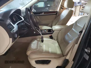 2012 Volkswagen Touareg Exec with VIN WVGEF9BP4CD011773, listed as a Copart auction lot 82461264 with 230,231 mi miles and Clean Title. Bid and sale history available at DreamBid. Image 7.