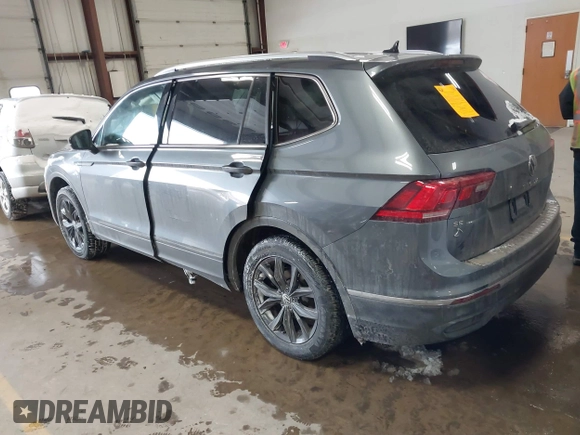 2023 Volkswagen Tiguan SE with VIN 3VVMB7AX5PM013447, listed as a IAAI auction lot 41615200 with 66,259 mi miles and . Bid and sale history available at DreamBid. Image 3.