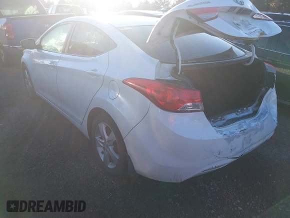 2013 Hyundai Elantra GLS z VIN 5NPDH4AE7DH404286, wystawiony jako IAAI lot #41180842 z przebiegiem 162 856 mil mil oraz . Historia ofert i sprzedaży dostępna na DreamBid. Obrazek 3.