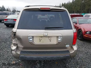 2004 Honda Pilot EX with VIN 2HKYF18694H538107, listed as a IAAI auction lot 41547655 with 254,755 mi miles. Bid and sale history available at carsss.com. Image 16.