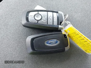 2021 Ford F-150 XL z VIN 1FTFW1E5XMFA57179, wystawiony jako IAAI lot #42561205 z przebiegiem 90 517 mil mil oraz . Historia ofert i sprzedaży dostępna na DreamBid. Obrazek 11.