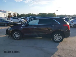 2018 Cadillac XT5 FWD with VIN 1GYKNARS6JZ179706, listed as a IAAI auction lot 41195570 with 80,676 mi miles. Bid and sale history available at carsss.com. Image 15.