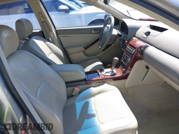 2004 Infiniti G35 w/Leather with VIN JNKCV51EX4M610376, listed as a IAAI auction lot 42022083 with 158,521 mi miles and . Bid and sale history available at DreamBid. Image 5.