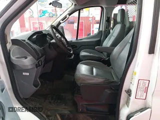 2015 Ford Transit Cargo with VIN 1FTNE1YM4FKA87516, listed as a IAAI auction lot 42901216 with 269,921 mi miles and . Bid and sale history available at DreamBid. Image 6.