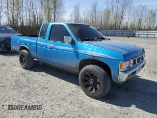 1997 Nissan Frontier XE with VIN 1N6SD16S0VC301978, listed as a Copart auction lot 51868585 with 183,836 mi miles and Clean title. Bid and sale history available at DreamBid. Image 4.