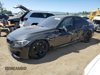 2018 BMW M3 with VIN WBS8M9C50J5K98422, listed as a Copart auction lot 57500235 with 62,915 mi miles and Salvage title. Bid and sale history available at DreamBid. Image 1.