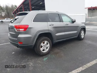 2011 Jeep Grand Cherokee 70th Anniversary with VIN 1J4RR4GG0BC608829, listed as a IAAI auction lot 41960876 with 231,714 mi miles. Bid and sale history available at carsss.com. Image 4.