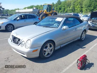 2002 Mercedes-Benz CLK 320/430 z VIN WDBLK70G12T129233, wystawiony jako IAAI lot #42391247 z przebiegiem 94 186 mil mil oraz . Historia ofert i sprzedaży dostępna na DreamBid. Obrazek 2.