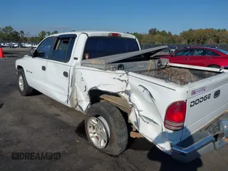 2001 Dodge Dakota Sport with VIN 1B7GL2AN81S127838, listed as a IAAI auction lot 40687174 with 235,301 mi miles. Bid and sale history available at carsss.com. Image 6.