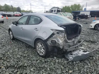 2018 Toyota Yaris with VIN 3MYDLBYV2JY329621, listed as a Copart auction lot 52351815 with 127,195 mi miles and Salvage Title. Bid and sale history available at DreamBid. Image 2.
