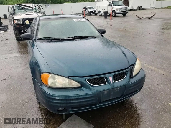 2002 Pontiac Grand Am SE z VIN 1G2NE52F92C172605, wystawiony jako Copart lot #56541555 z przebiegiem 164 600 mil mil oraz Szkoda całkowita • Salvage title. Historia ofert i sprzedaży dostępna na DreamBid. Obrazek 13.