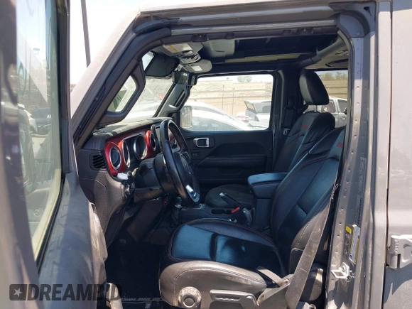 2023 Jeep Wrangler Rubicon with VIN 1C4JJXFG7PW541813, listed as a IAAI auction lot 42640045 with 53,645 mi miles and . Bid and sale history available at DreamBid. Image 5.