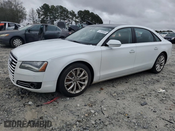 2014 Audi A8 3.0T z VIN WAURGAFD3EN003758, wystawiony jako Copart lot #47636885 z przebiegiem 166 990 mil mil oraz Szkody całkowita. Historia ofert i sprzedaży dostępna na DreamBid. Obrazek 1.
