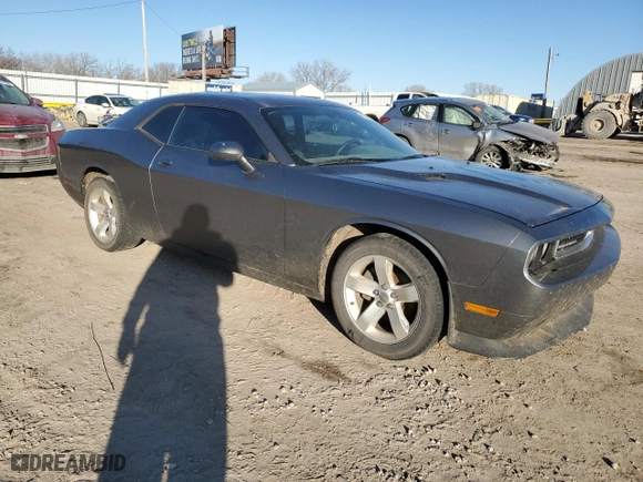 2011 Dodge Challenger with VIN 2B3CJ4DG7BH570893, listed as a Copart auction lot 42389315 with 131,889 mi miles and Salvage Title. Bid and sale history available at carsss.com. Image 4.