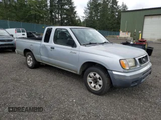 2000 Nissan Frontier XE with VIN 1N6DD26S9YC331662, listed as a Copart auction lot 56790225 with 180,272 mi miles and Clean title. Bid and sale history available at DreamBid. Image 4.