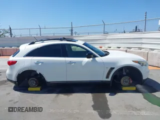 2016 Infiniti QX70 with VIN JN8CS1MW1GM750798, listed as a IAAI auction lot 42519800 with 139,940 mi miles and . Bid and sale history available at DreamBid. Image 14.
