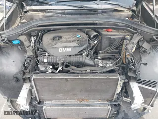 2018 BMW X1 sDrive28i with VIN WBXHU7C39J5L07129, listed as a IAAI auction lot 41472014 with 56,486 mi miles. Bid and sale history available at carsss.com. Image 10.