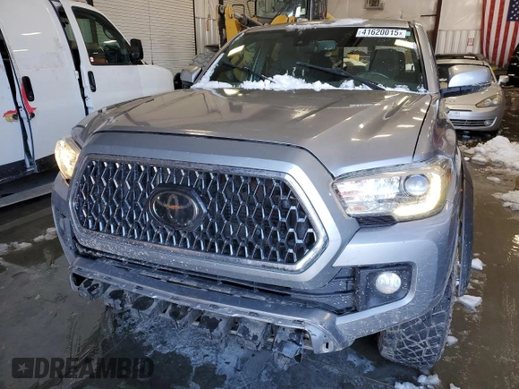 2018 Toyota Tacoma SR z VIN 3TMCZ5AN2JM122416, wystawiony jako Copart lot #41620015 z przebiegiem Nie podano mil oraz Szkoda całkowita • Salvage title. Historia ofert i sprzedaży dostępna na DreamBid. Obrazek 5.