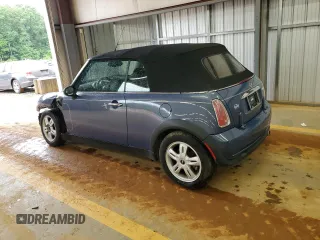 2005 MINI Convertible with VIN WMWRF33485TG10496, listed as a Copart auction lot 58582955 with 107,641 mi miles and Salvage title. Bid and sale history available at DreamBid. Image 2.