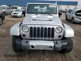 2012 Jeep Wrangler Arctic with VIN 1C4AJWBG4CL131823, listed as a Copart auction lot 87161194 with 152,124 mi miles and Clean title. Bid and sale history available at DreamBid. Image 5.