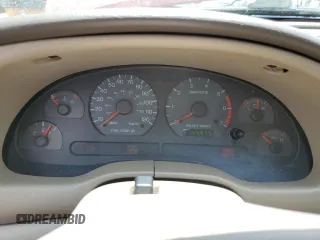 2002 Ford Mustang Deluxe z VIN 1FAFP44472F107630, wystawiony jako Copart lot #56256865 z przebiegiem 214 457 mil mil oraz Szkoda całkowita • Salvage title. Historia ofert i sprzedaży dostępna na DreamBid. Obrazek 9.